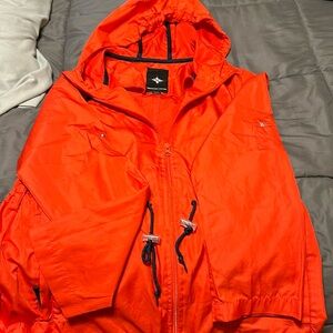 Woman’s Rain Jacket worn a hand full of times in great condition.